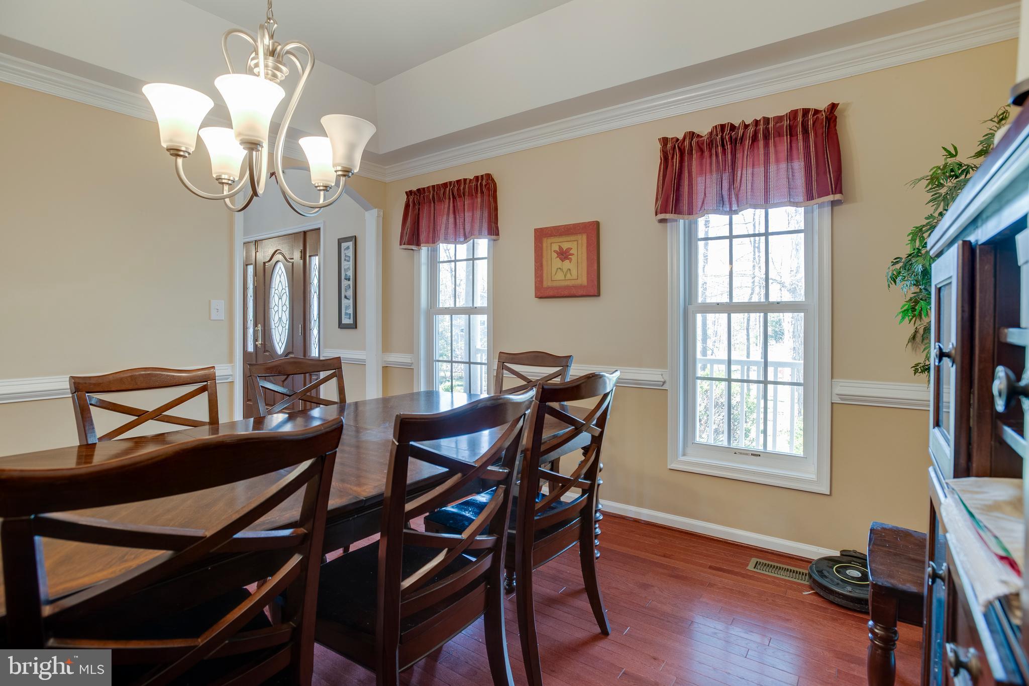 101 Saylers Creek Road Locust Grove, VA 22508 - Photo 8 of 81 a view of a dining room with furniture window and wooden floor