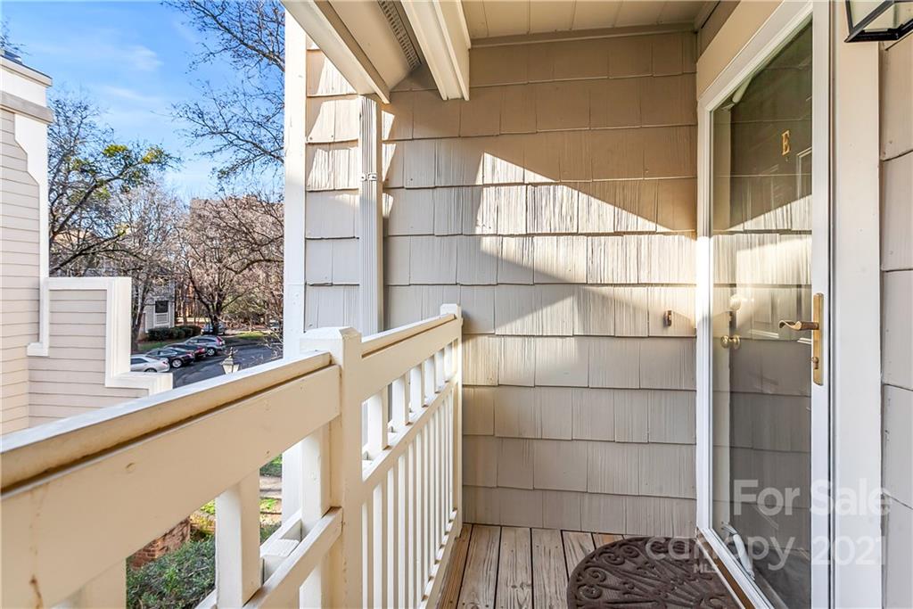 5011 Sharon Road, Unit E Charlotte, NC 28210 - Photo 2 of 19 a view of a balcony