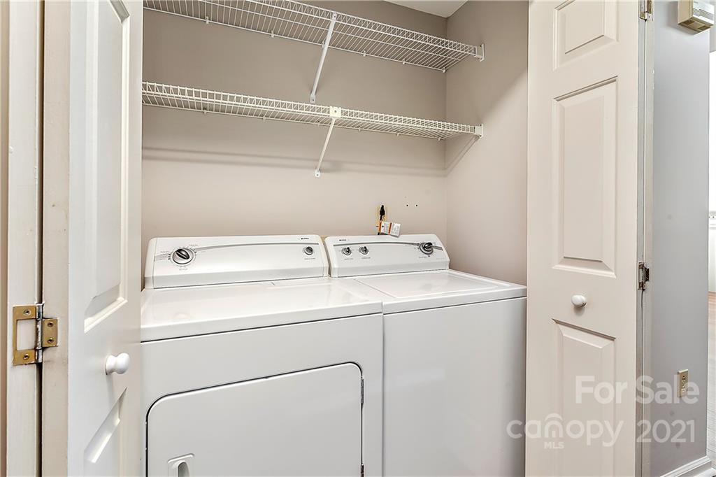 5011 Sharon Road, Unit E Charlotte, NC 28210 - Photo 15 of 19 a utility room with dryer and washer