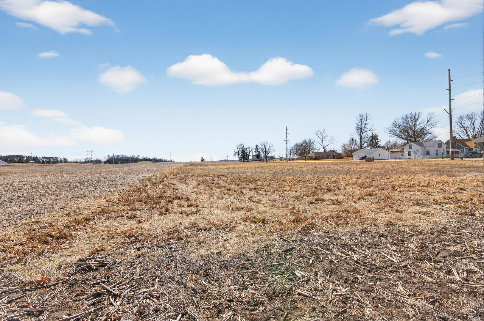 Lot 3 5th Street Calamus, IA 52729 - Photo 3 of 8 a view of a large body of water with a building in the background