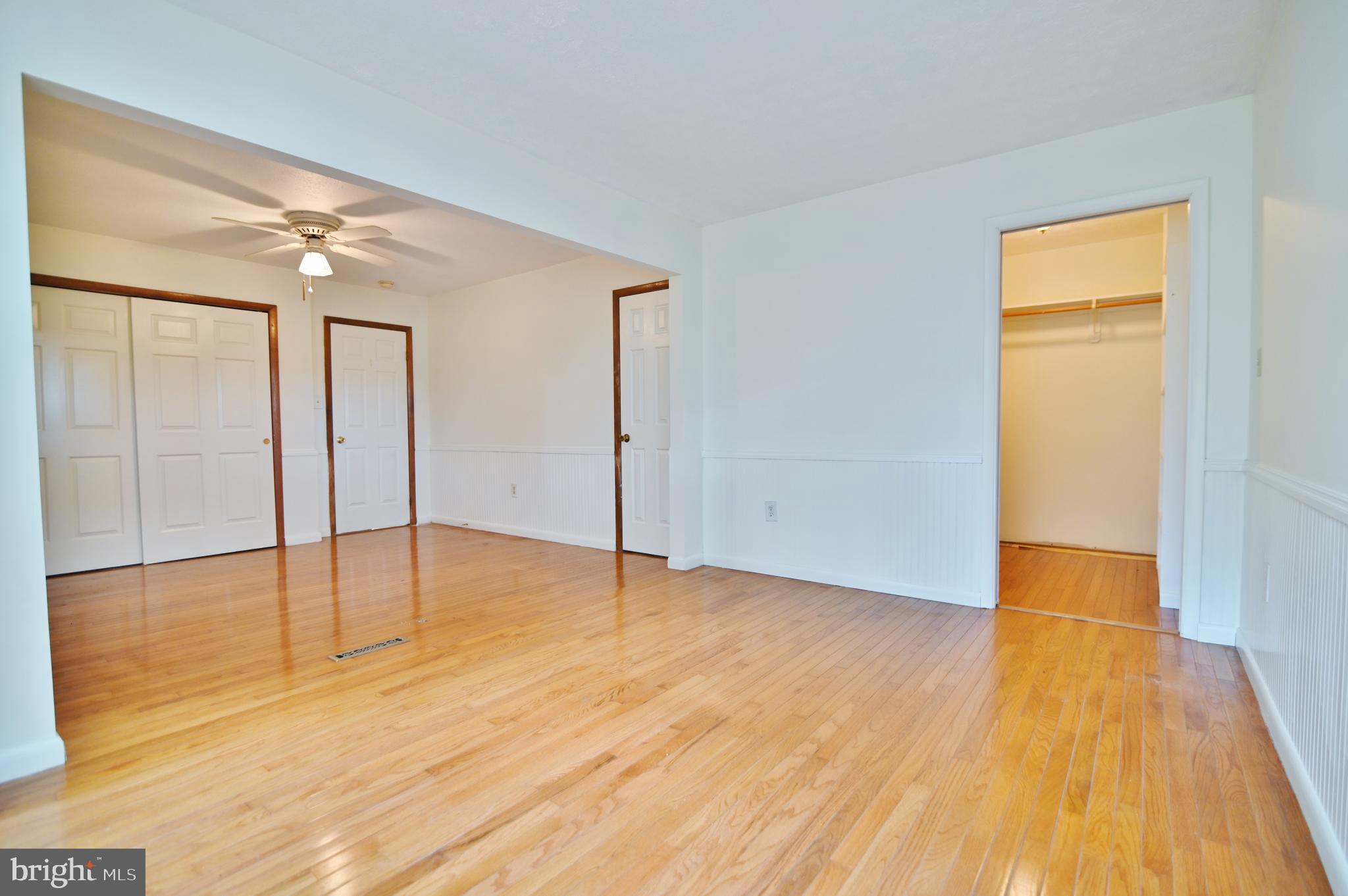 2784 Ridge Hollow Road Edinburg, VA 22824 - Photo 28 of 60 a view of an empty room with wooden floor