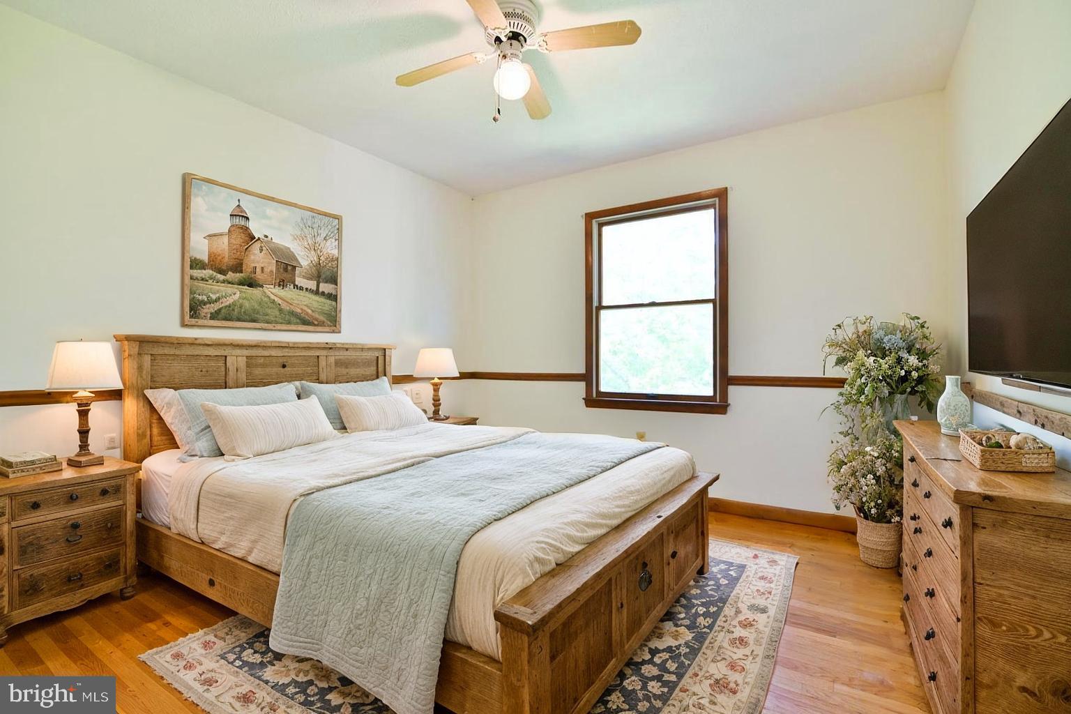 2784 Ridge Hollow Road Edinburg, VA 22824 - Photo 33 of 60 a bedroom with bed and a window
