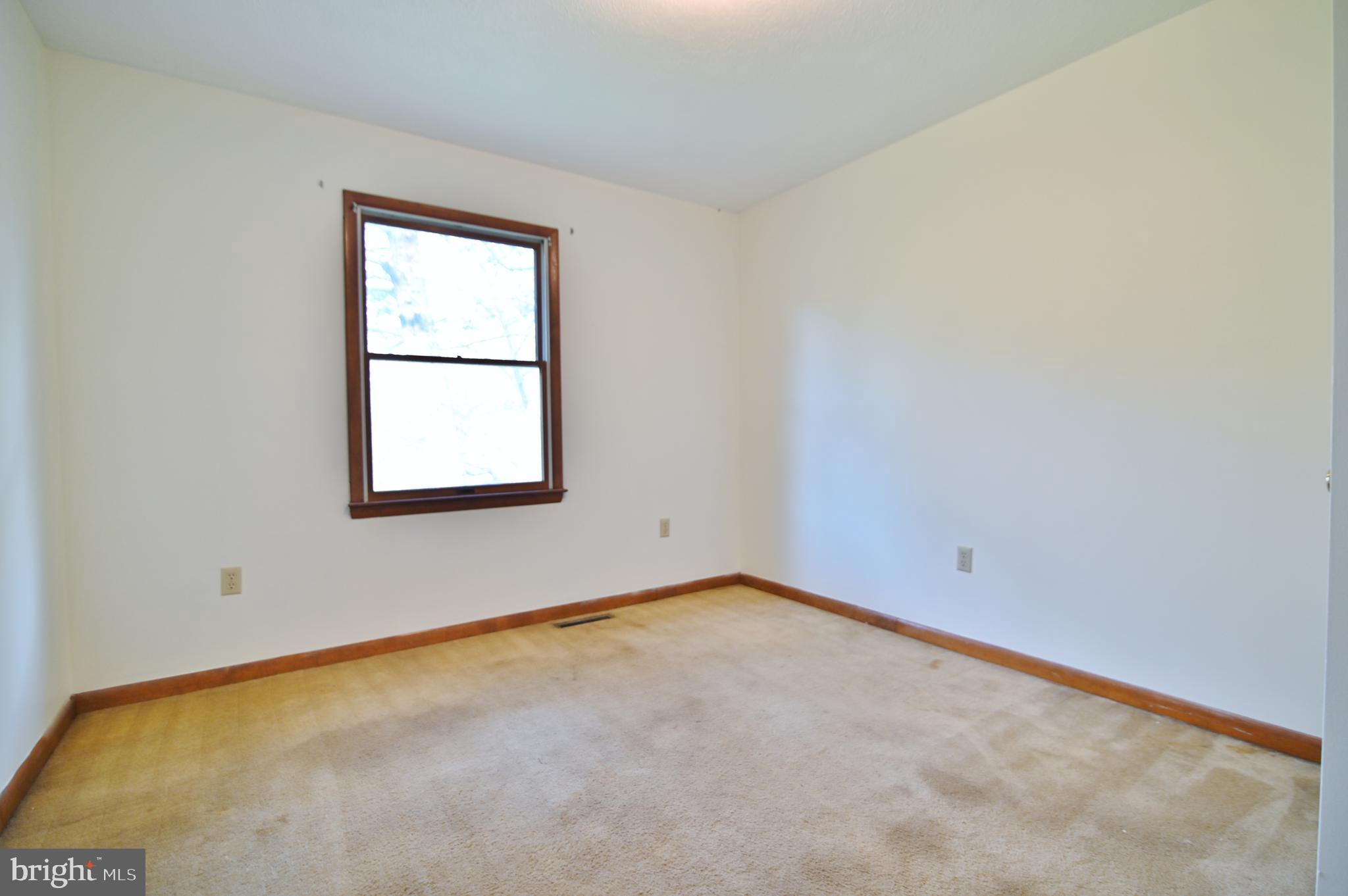 2784 Ridge Hollow Road Edinburg, VA 22824 - Photo 35 of 60 an empty room with a window