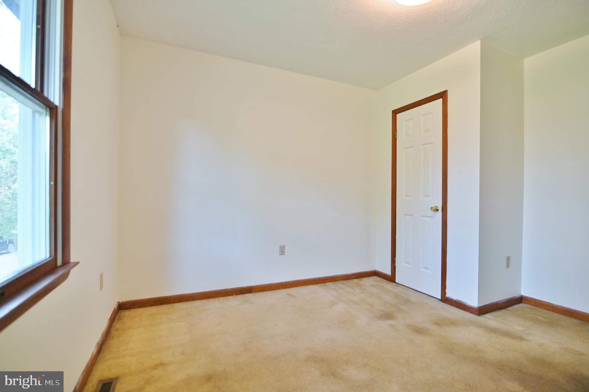 2784 Ridge Hollow Road Edinburg, VA 22824 - Photo 37 of 60 a view of an empty room and window
