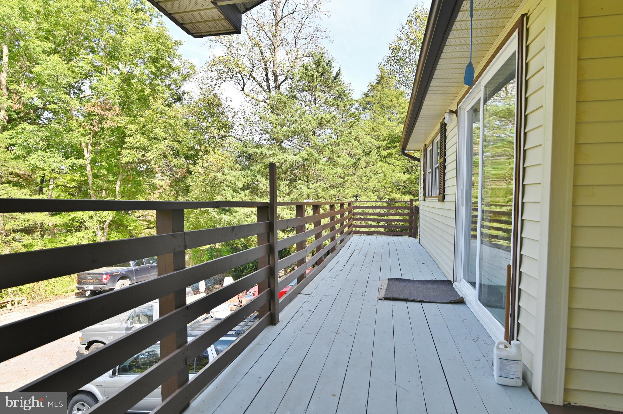 2784 Ridge Hollow Road Edinburg, VA 22824 - Photo 40 of 60 a view of balcony with wooden floor
