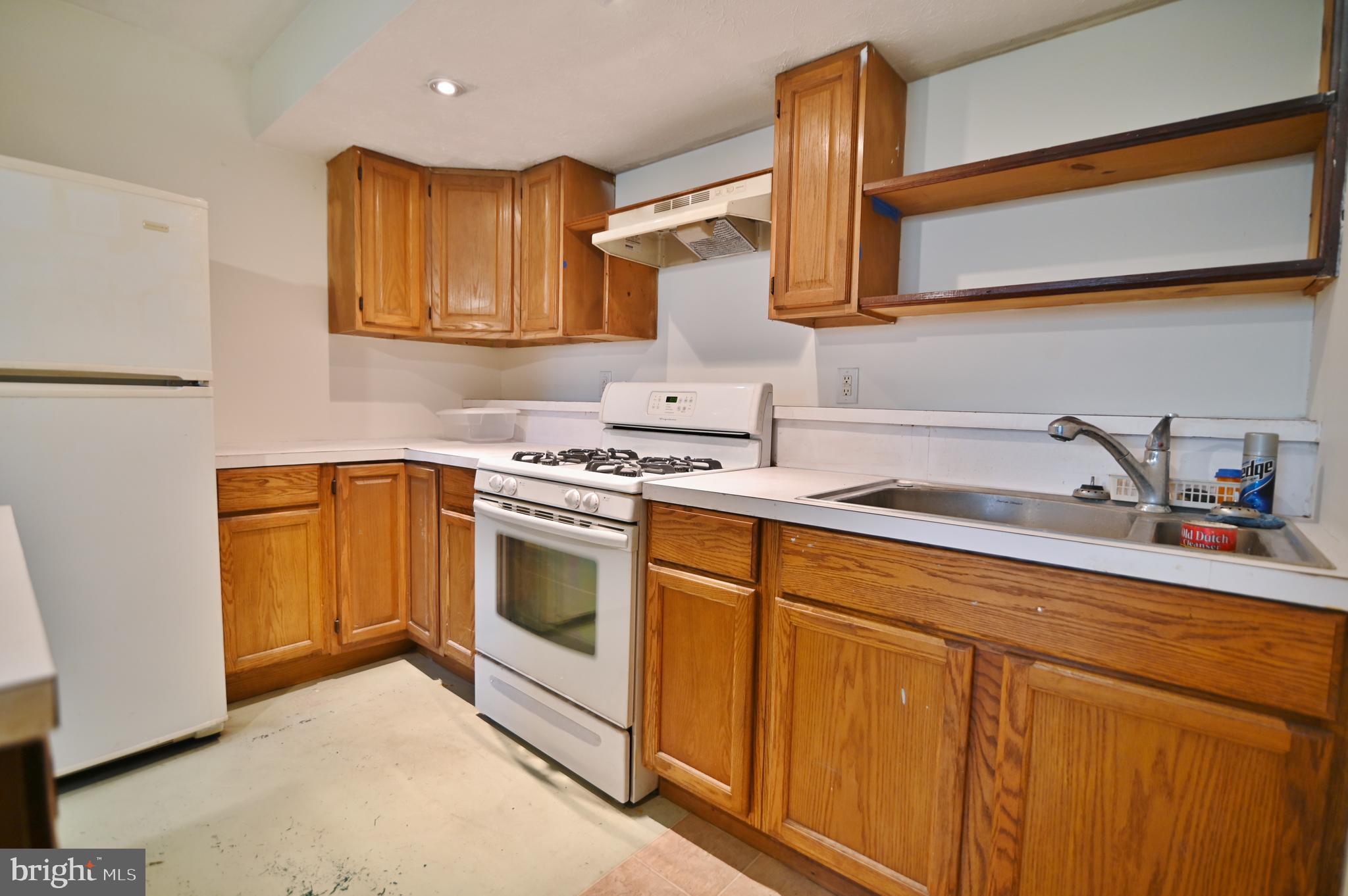 2784 Ridge Hollow Road Edinburg, VA 22824 - Photo 49 of 60 a kitchen with stainless steel appliances granite countertop a sink and cabinets