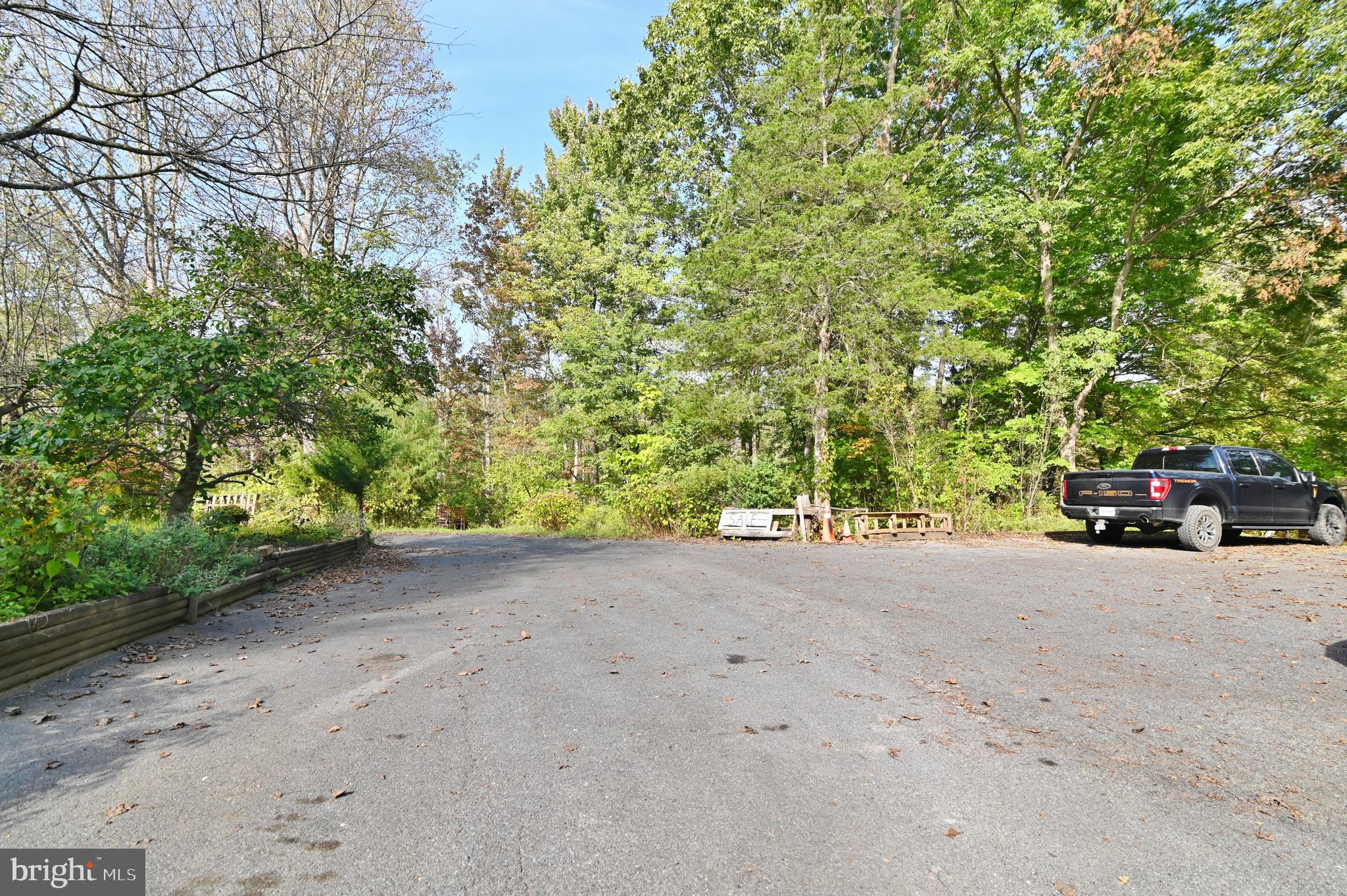 2784 Ridge Hollow Road Edinburg, VA 22824 - Photo 51 of 60 a view of a car with a road near a forest