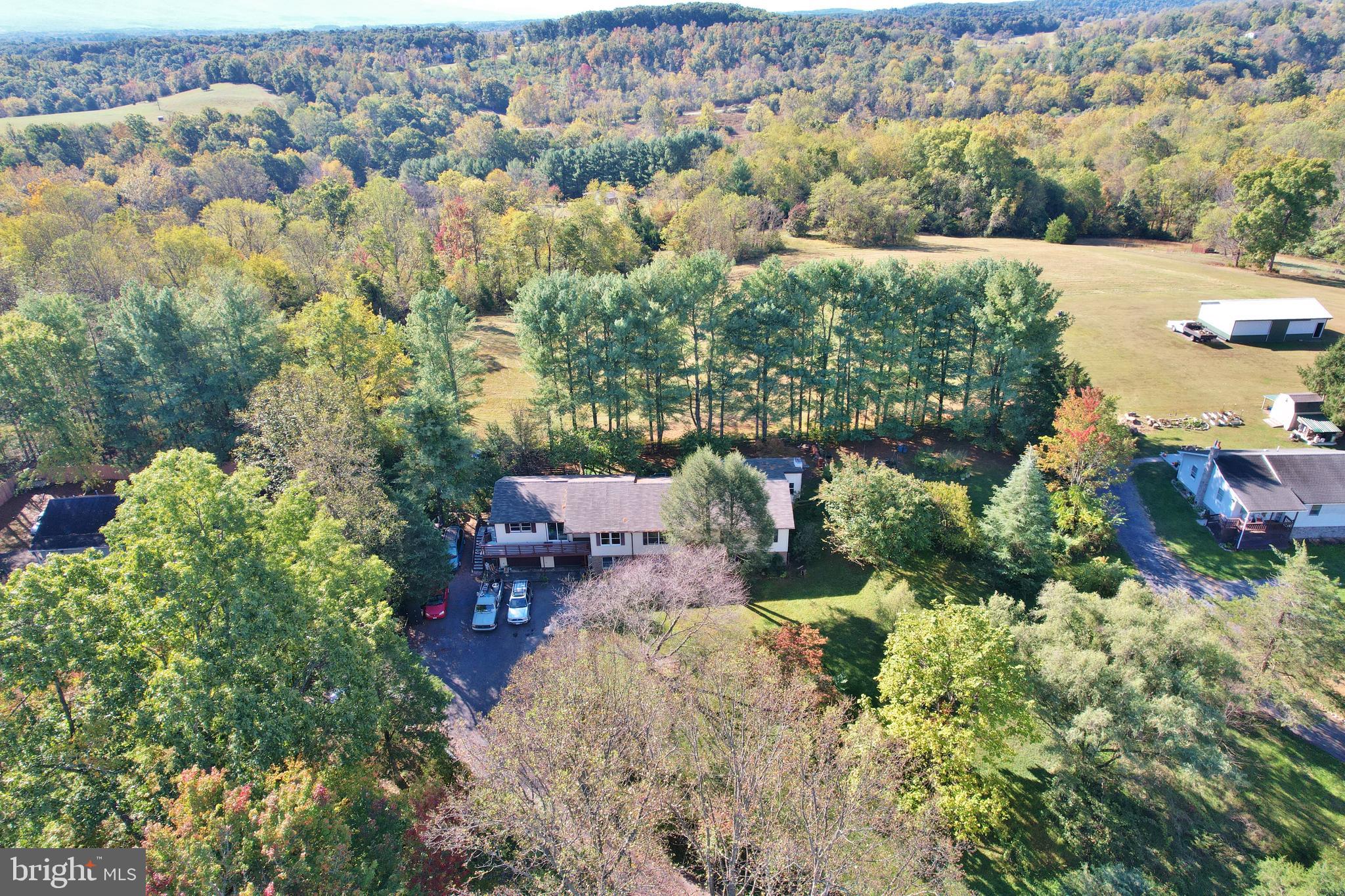 2784 Ridge Hollow Road Edinburg, VA 22824 - Photo 53 of 60 an aerial view of residential house with green space
