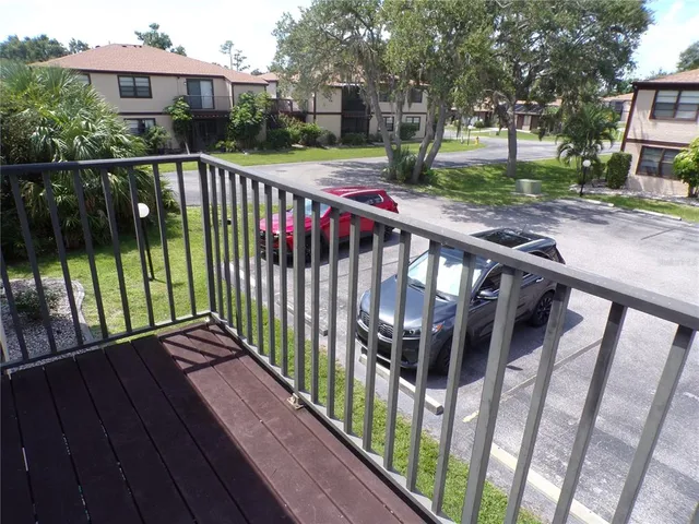 a view of street from balcony