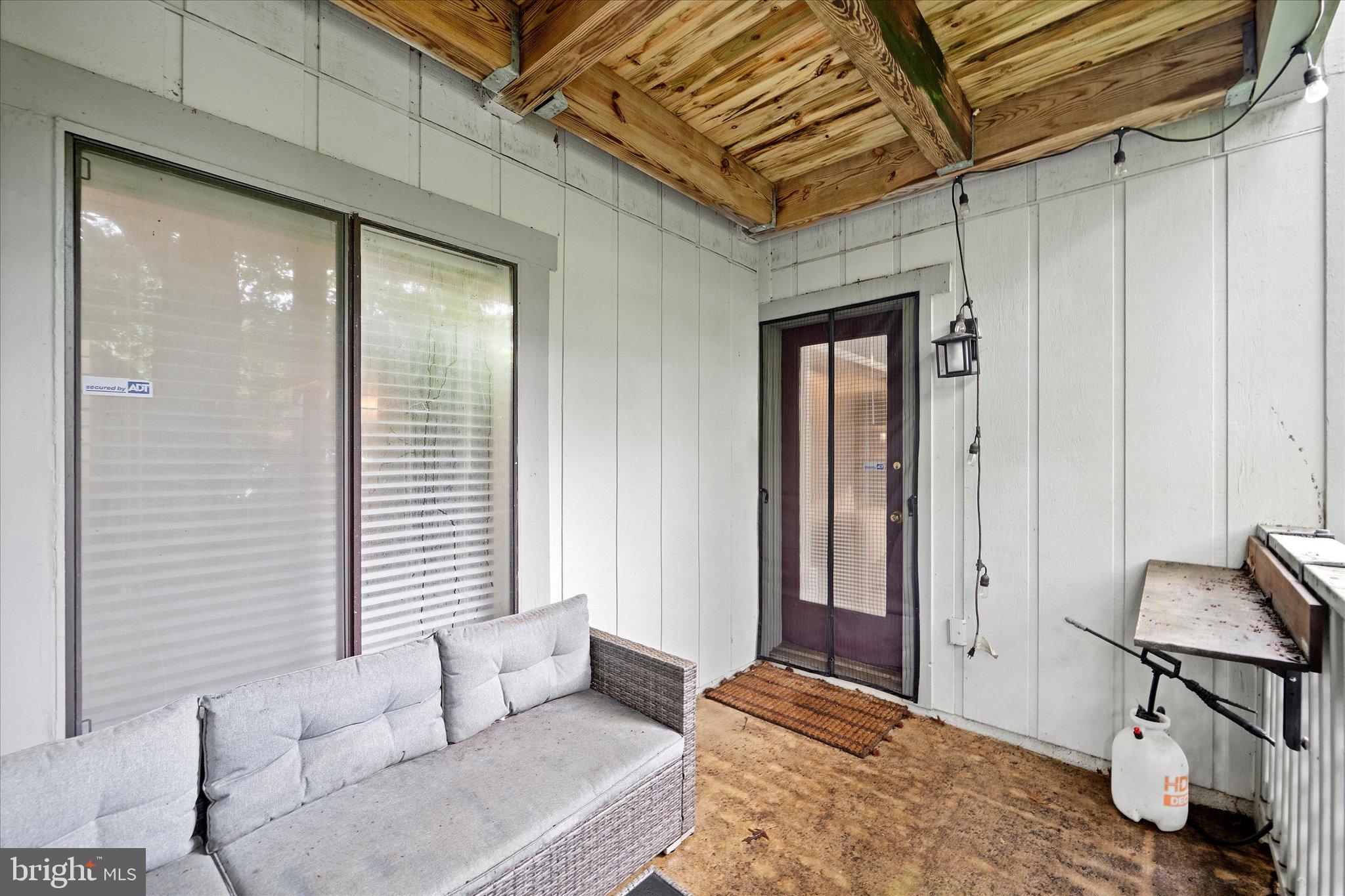 2221 Hunter's Run Drive Reston, VA 20191 - Photo 25 of 25 a bedroom with a bed and wooden floor