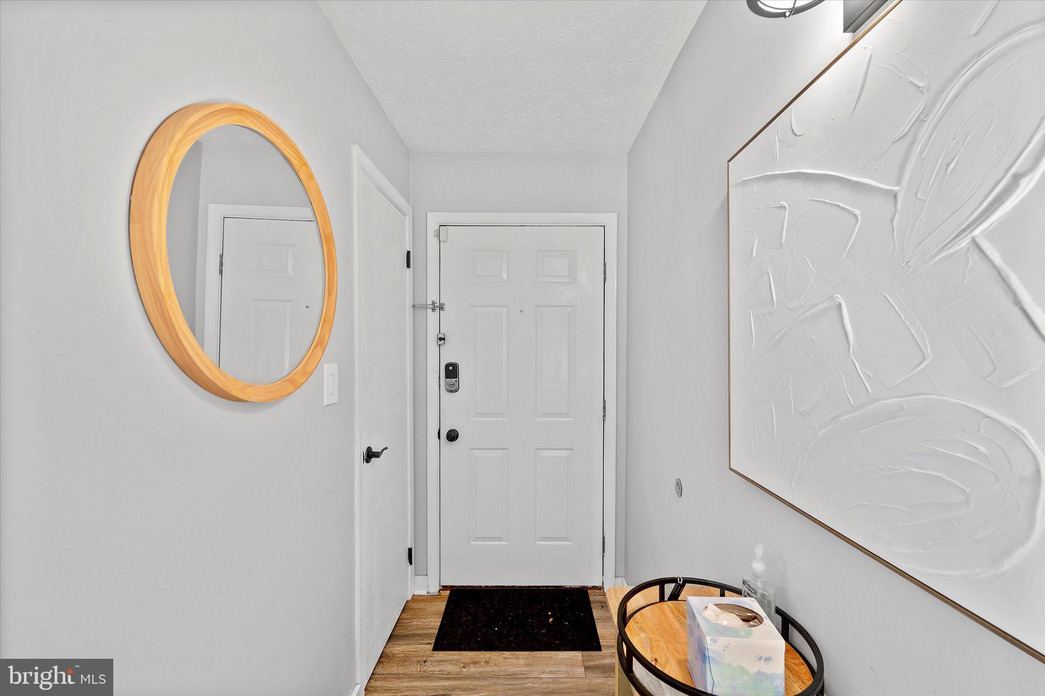 2221 Hunter's Run Drive Reston, VA 20191 - Photo 5 of 25 a front view of a house with garden