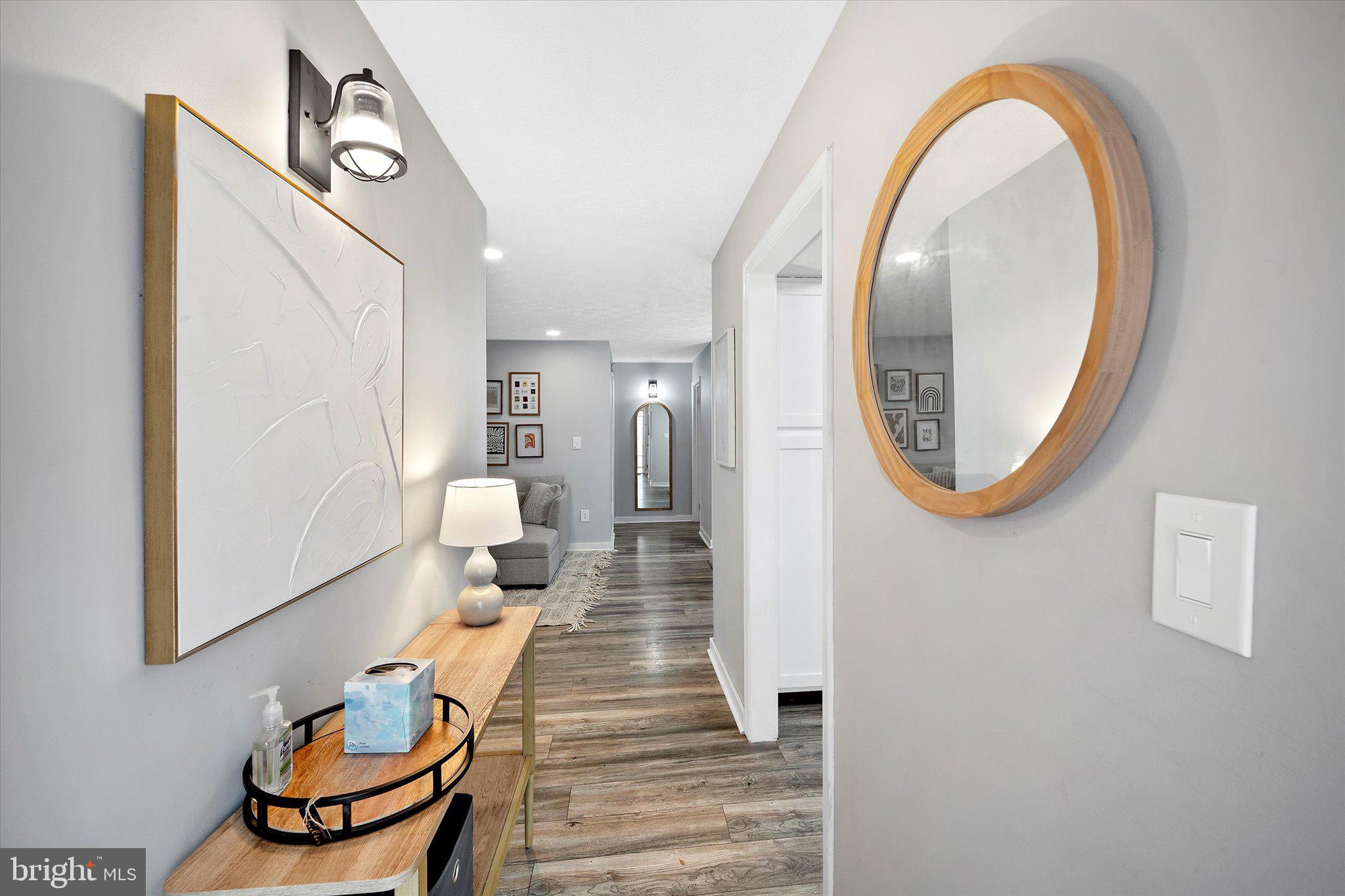 2221 Hunter's Run Drive Reston, VA 20191 - Photo 6 of 25 workspace with wooden floor mirror and window