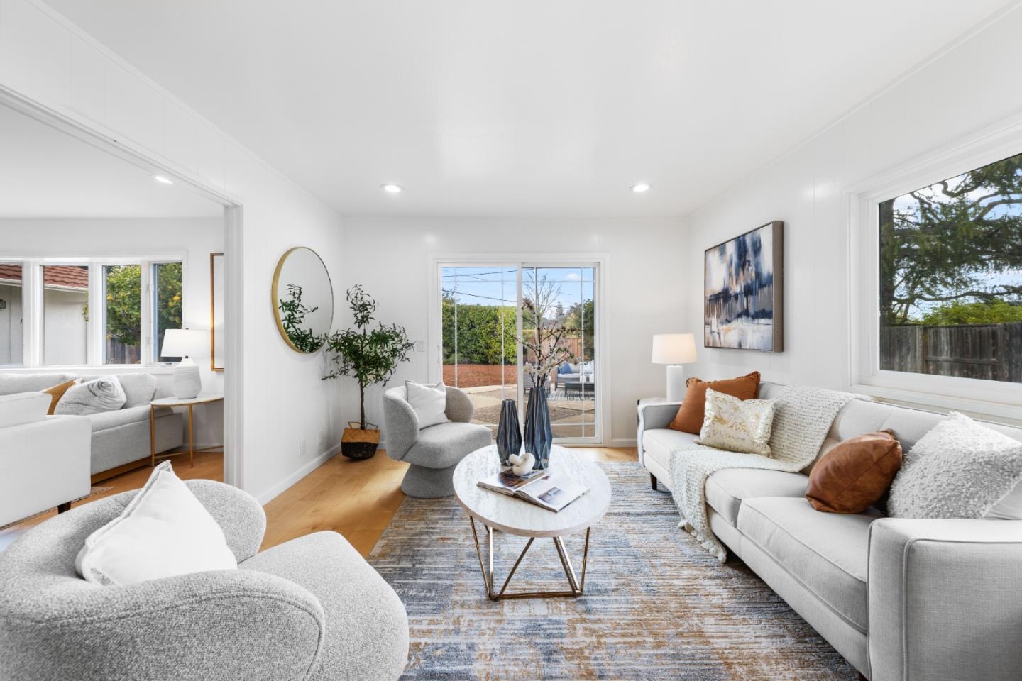 1637 Kitchener Drive Sunnyvale, CA 94087 - Photo 11 of 57 a living room with furniture and a wooden floor