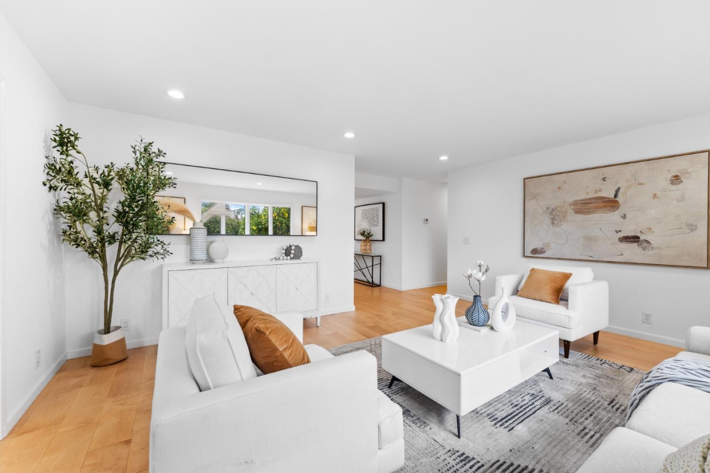1637 Kitchener Drive Sunnyvale, CA 94087 - Photo 12 of 57 a living room with furniture and a potted plant