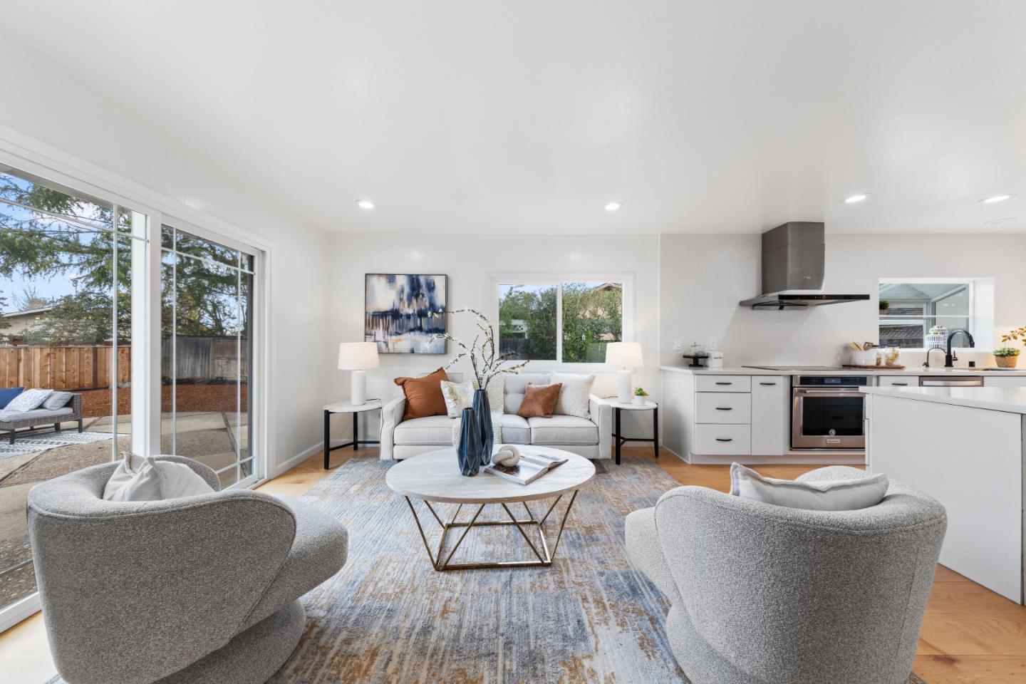 1637 Kitchener Drive Sunnyvale, CA 94087 - Photo 15 of 57 a living room with furniture and a table