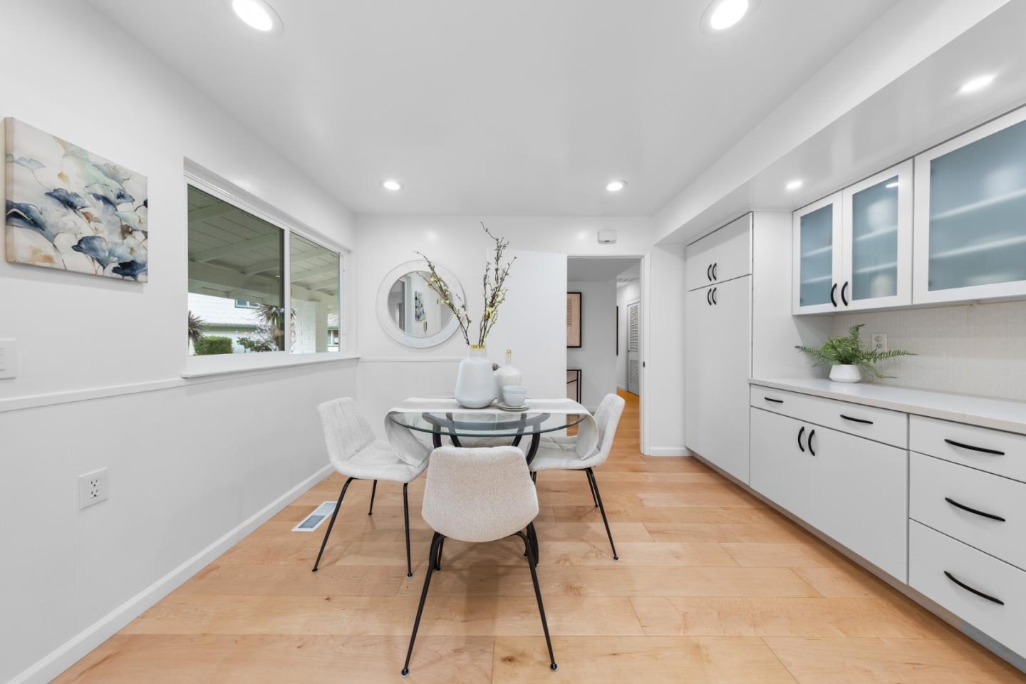 1637 Kitchener Drive Sunnyvale, CA 94087 - Photo 22 of 57 a view of a dining room with furniture window and wooden floor
