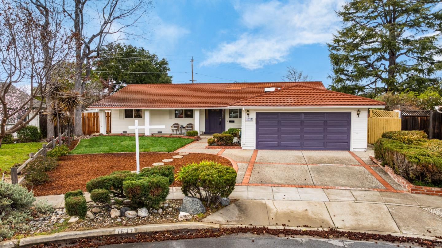 1637 Kitchener Drive Sunnyvale, CA 94087 - Photo 3 of 57 a front view of a house with garden