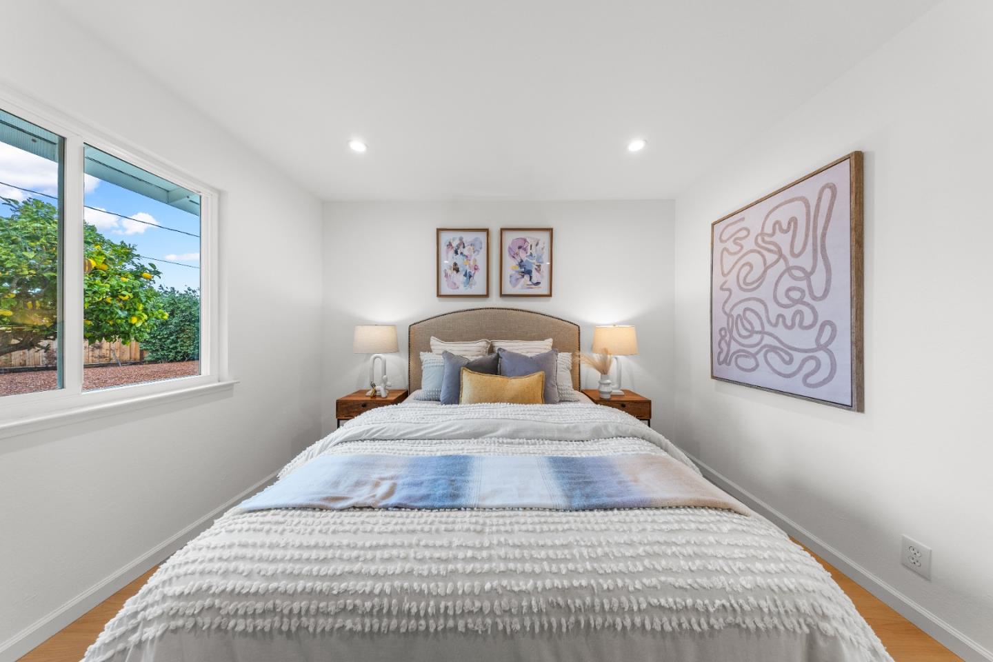 1637 Kitchener Drive Sunnyvale, CA 94087 - Photo 34 of 57 a bedroom with a large bed and a window