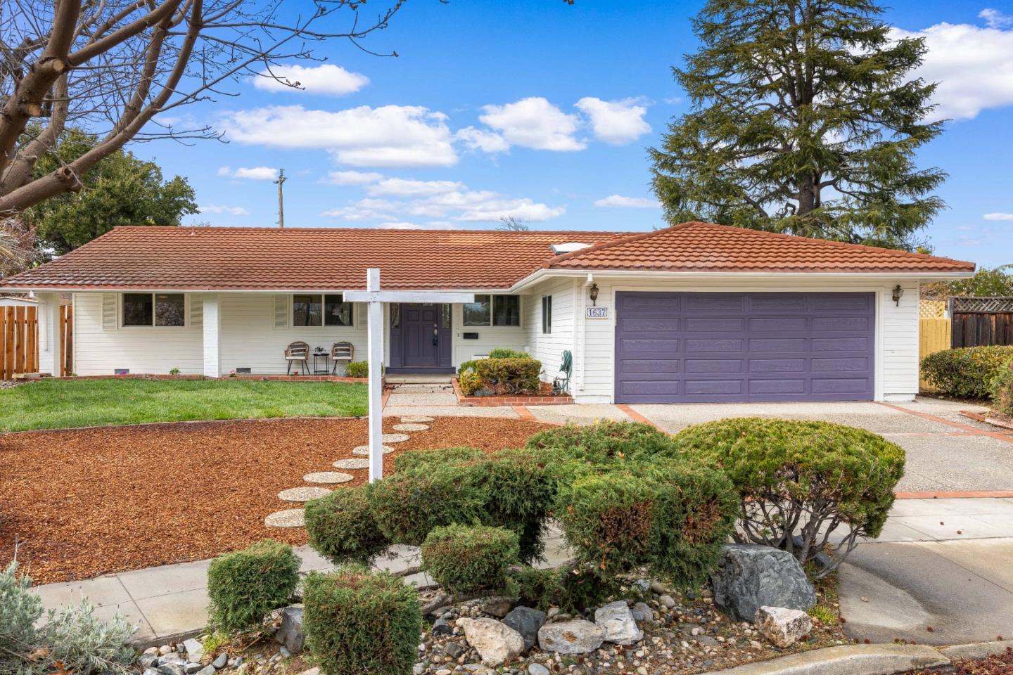 1637 Kitchener Drive Sunnyvale, CA 94087 - Photo 4 of 57 front view of a house with a yard