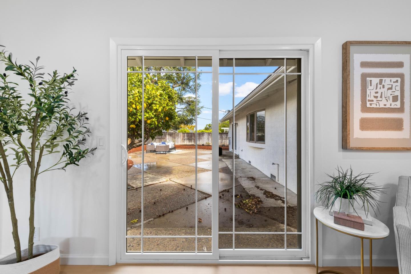 1637 Kitchener Drive Sunnyvale, CA 94087 - Photo 43 of 57 a very nice looking room with a large window and potted plants