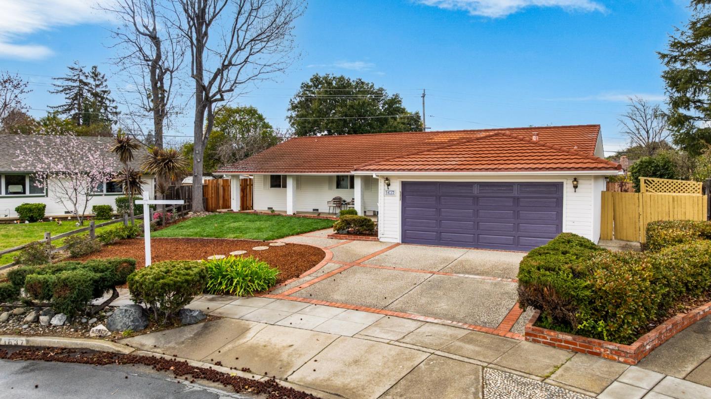 1637 Kitchener Drive Sunnyvale, CA 94087 - Photo 51 of 57 a front view of a house with garden