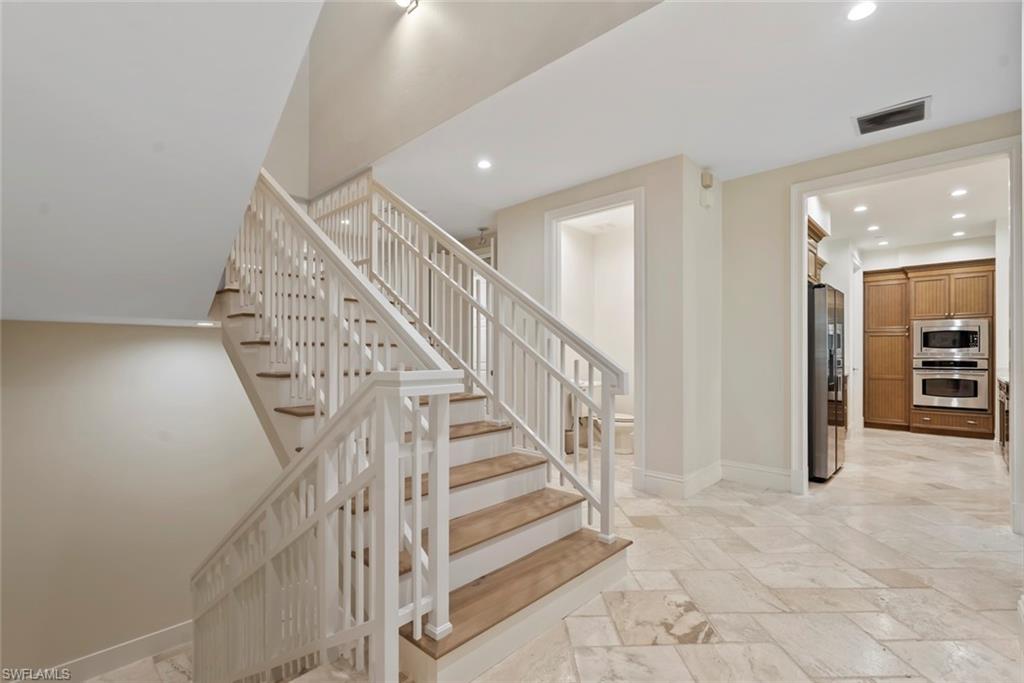 1001 10th Avenue South, Unit C1 Naples, FL 34102 - Photo 22 of 38 a view of entryway and hall with a front door