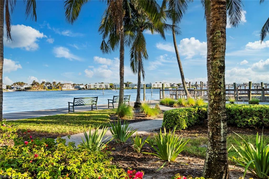 1001 10th Avenue South, Unit C1 Naples, FL 34102 - Photo 25 of 38 a view of a lake with a city