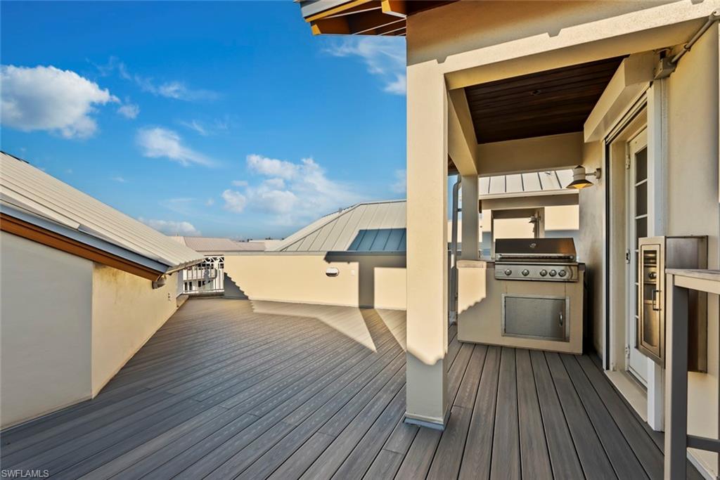 1001 10th Avenue South, Unit C1 Naples, FL 34102 - Photo 36 of 38 a view of a kitchen from a building