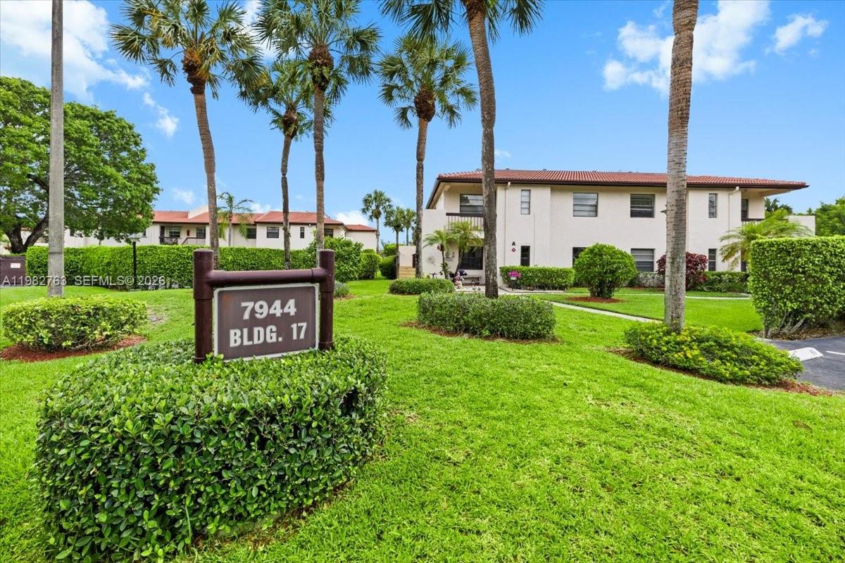 7944 Eastlake Drive, Unit D Boca Raton, FL 33433 - Photo 27 of 29 a view of a house with a garden