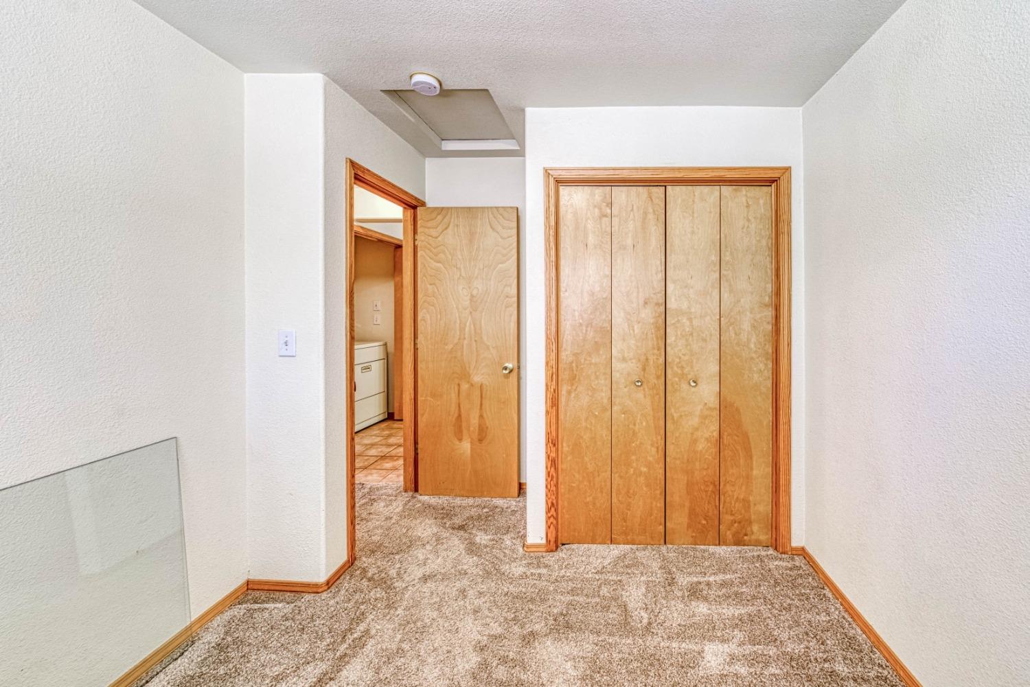 34075 Shaver Springs Road Auberry, CA 93602 - Photo 22 of 41 a view of an empty room and window