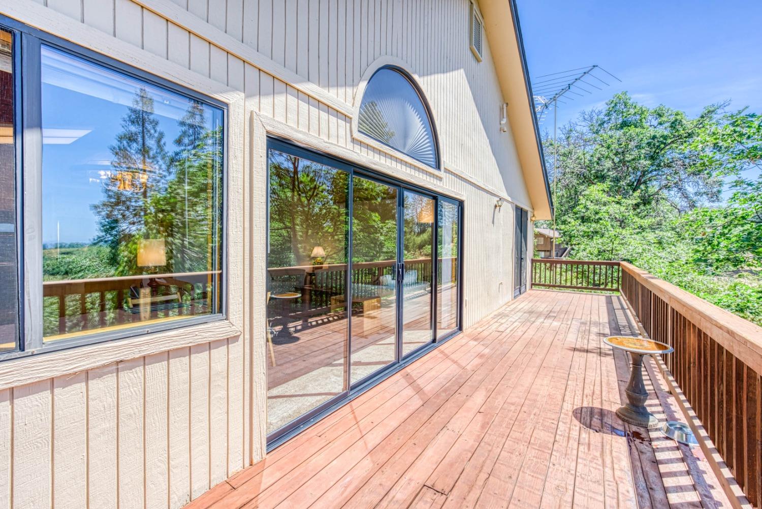 34075 Shaver Springs Road Auberry, CA 93602 - Photo 28 of 41 a view of a balcony with wooden floor and fence