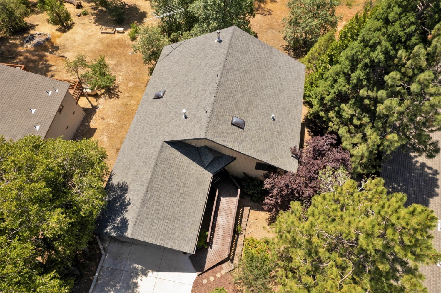 34075 Shaver Springs Road Auberry, CA 93602 - Photo 31 of 41 an aerial view of a house with a yard and garden