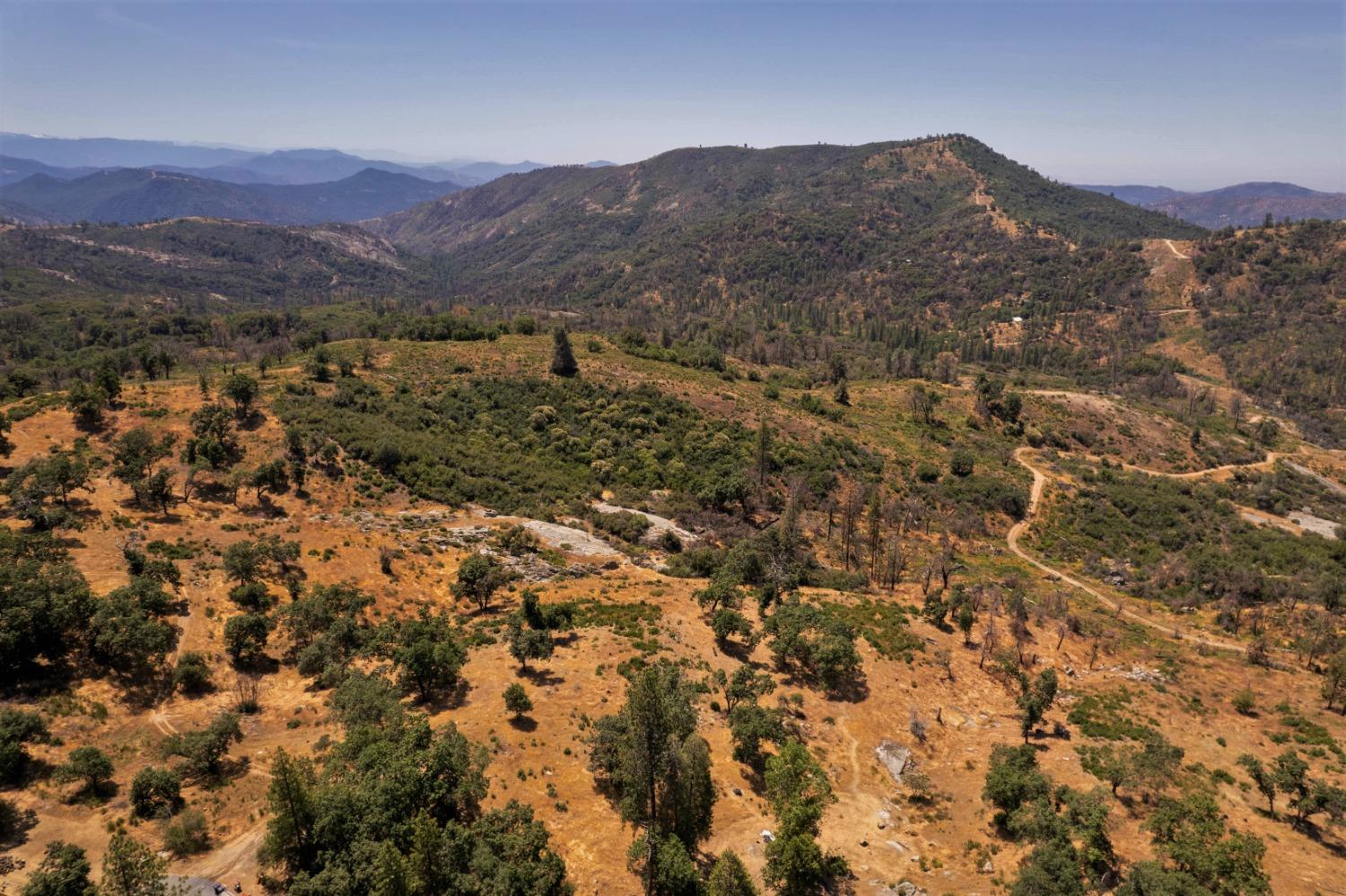 34075 Shaver Springs Road Auberry, CA 93602 - Photo 35 of 41 a view of a city with mountains in the background
