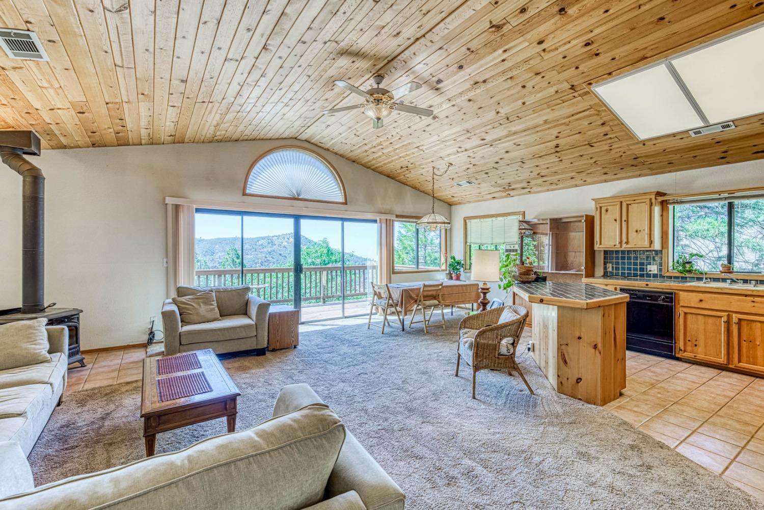 34075 Shaver Springs Road Auberry, CA 93602 - Photo 6 of 41 a living room with furniture and a large window