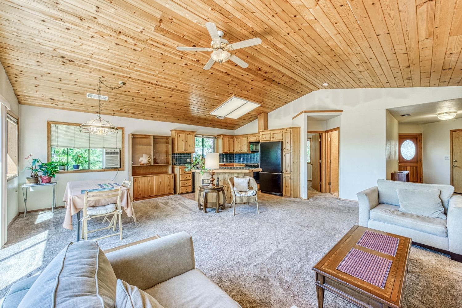 34075 Shaver Springs Road Auberry, CA 93602 - Photo 7 of 41 a living room with furniture and a table