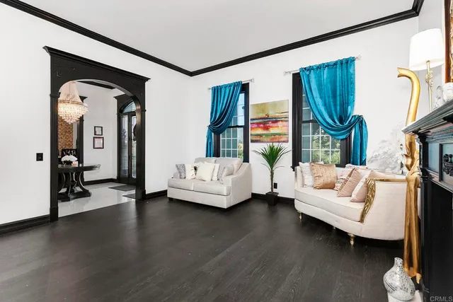 a view of a livingroom with furniture and a bookshelf