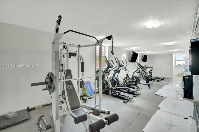 a view of a room with gym equipment