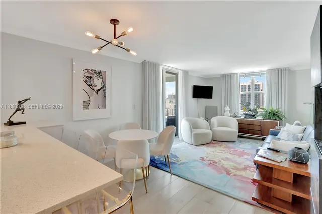 a spacious bedroom with a bed a couch and a window