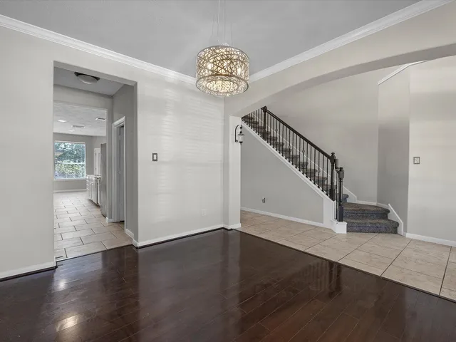 a view of entryway with wooden floor