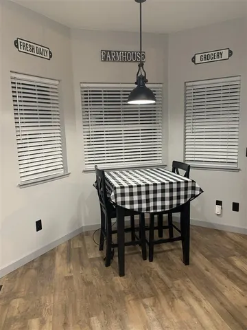 a bedroom with furniture and window