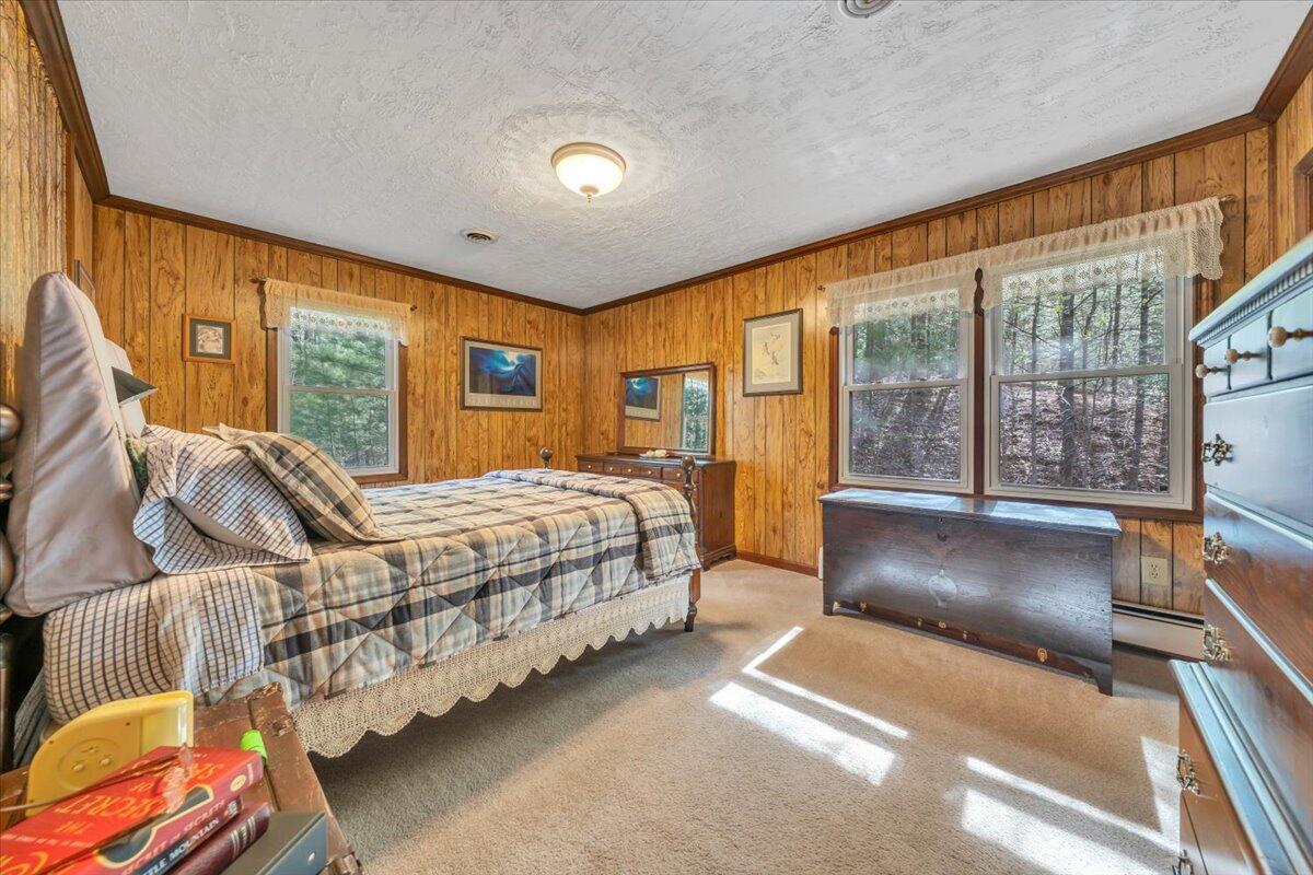 3878 Harborwood Road Salem, VA 24153 - Photo 27 of 60 a bedroom with a bed and glass window