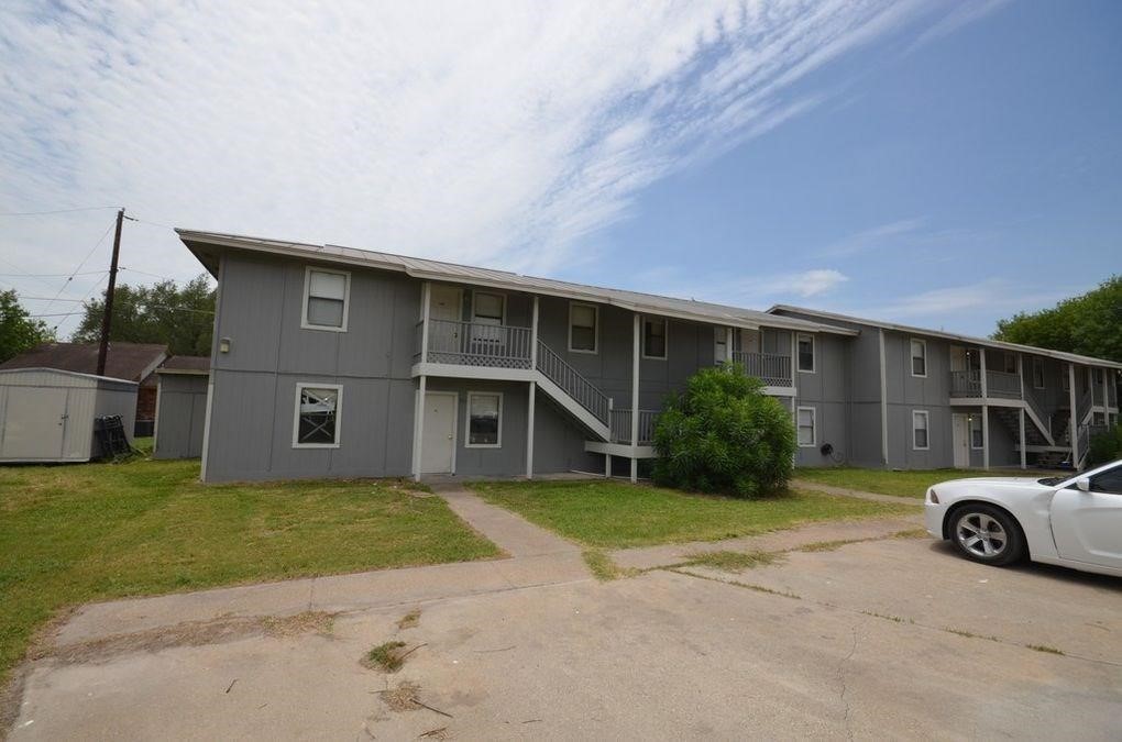 1870 King David Drive, Unit 206 Three Rivers, TX 78071 - Photo 1 of 6 a view of a house with a patio and a yard