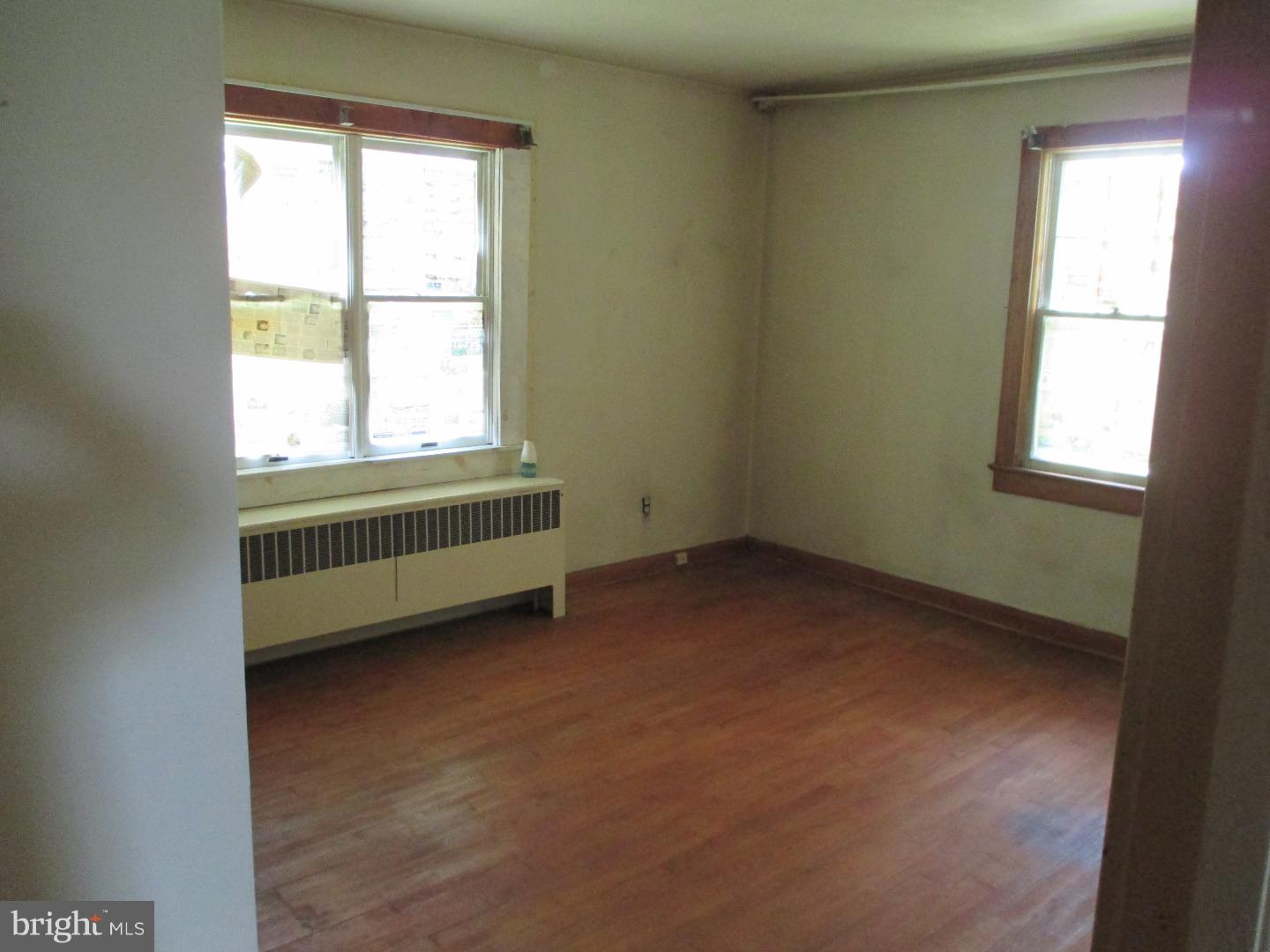 97 Schoolhouse Road Carneys Point, NJ 08069 - Photo 13 of 25 an empty room with a window