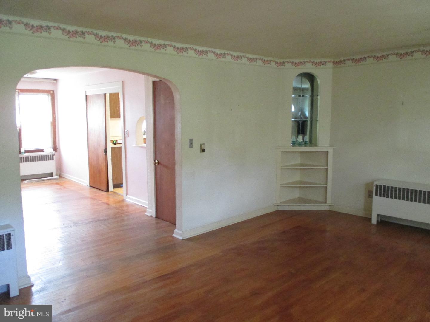 97 Schoolhouse Road Carneys Point, NJ 08069 - Photo 3 of 25 wooden floor in an empty room