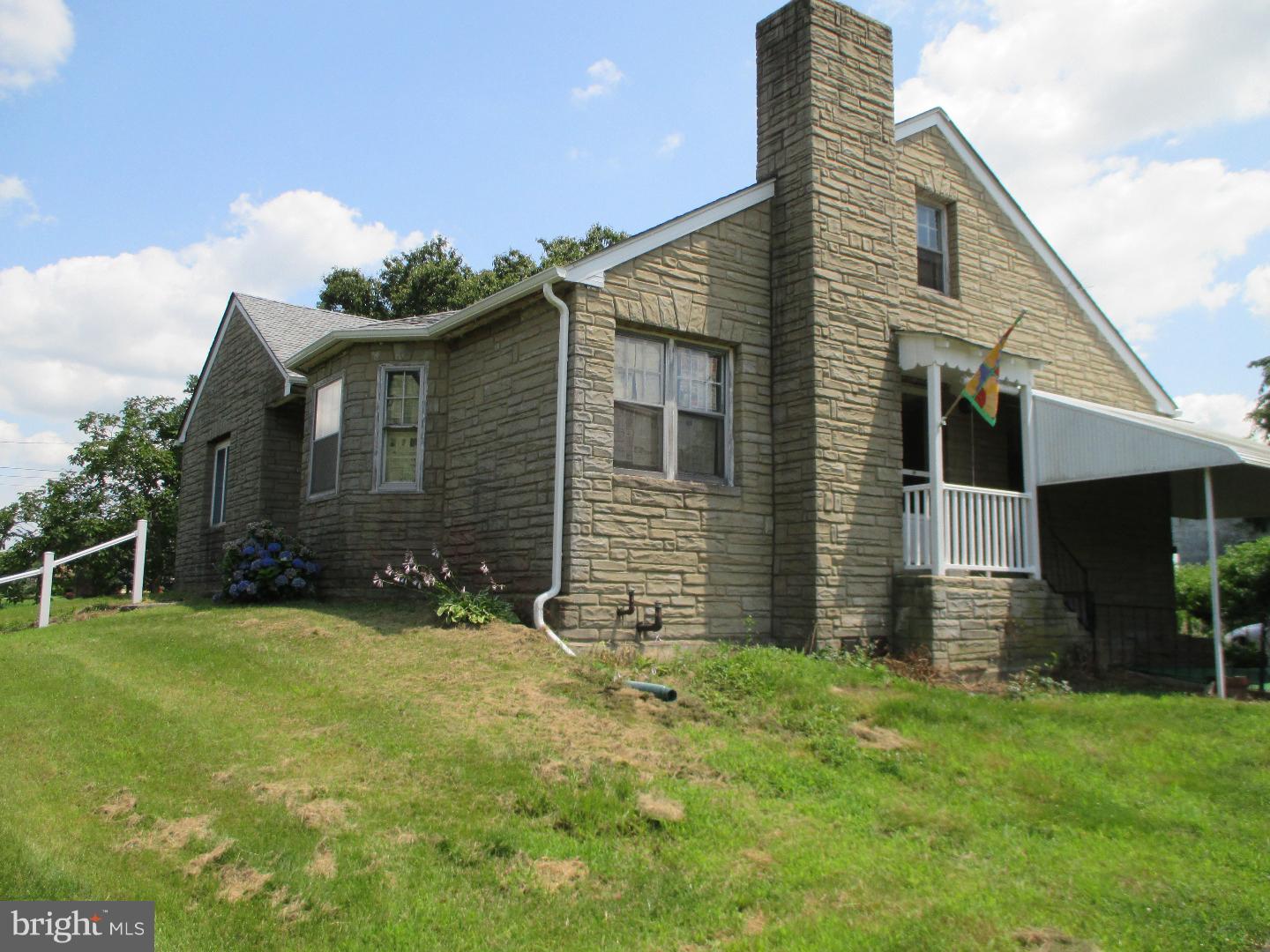 97 Schoolhouse Road Carneys Point, NJ 08069 - Photo 21 of 25 a front view of house with yard and green space