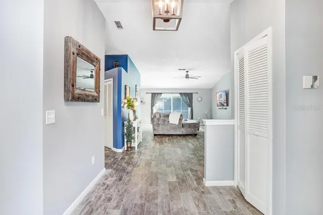 a view of living room with furniture and window