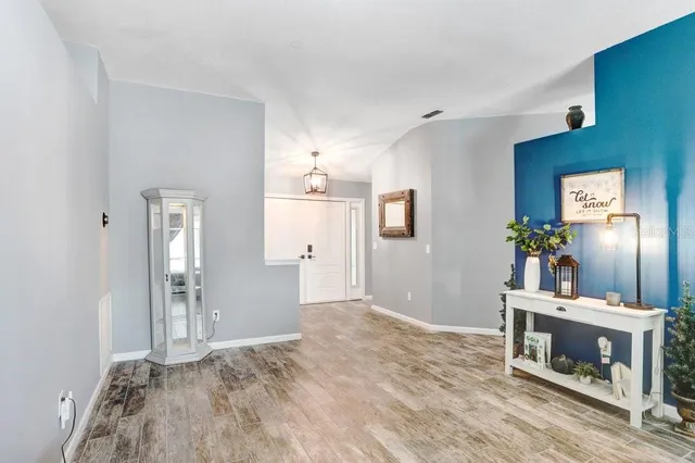 a bedroom with a bed and a fireplace