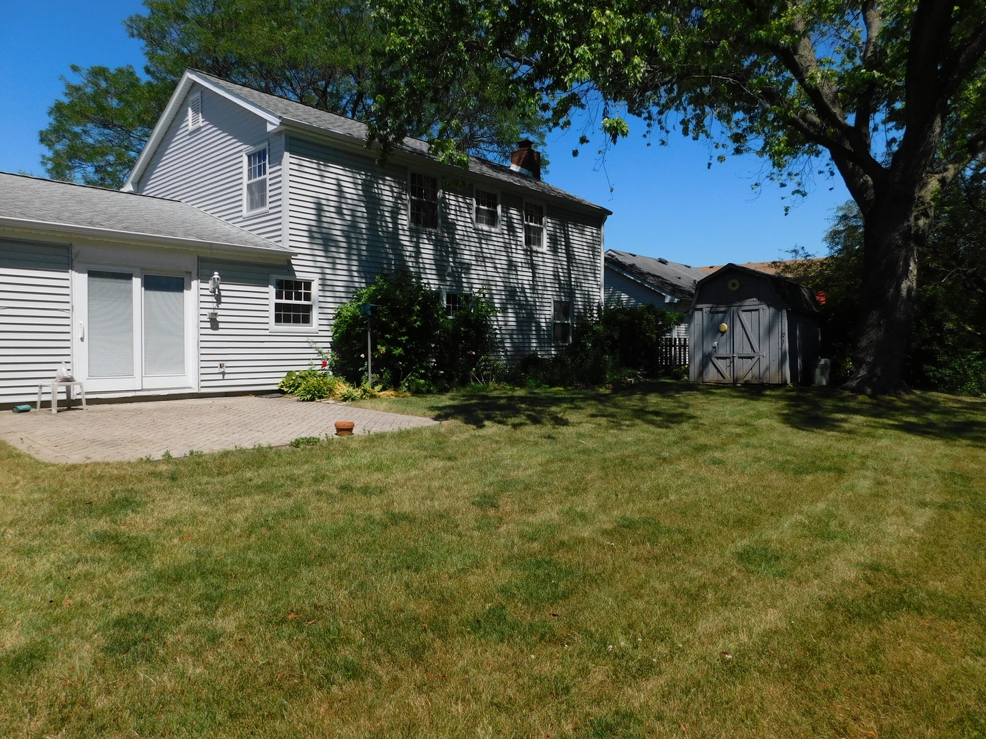 213 Weidner Road Buffalo Grove, IL 60089 - Photo 15 of 15 a view of a house with a yard
