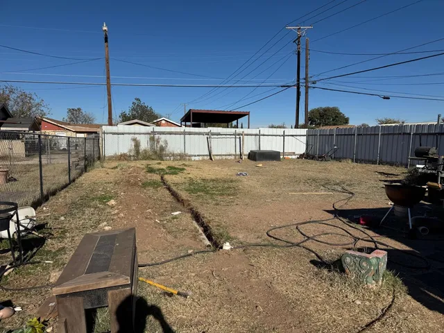 a view of a terrace with wooden floor chairs