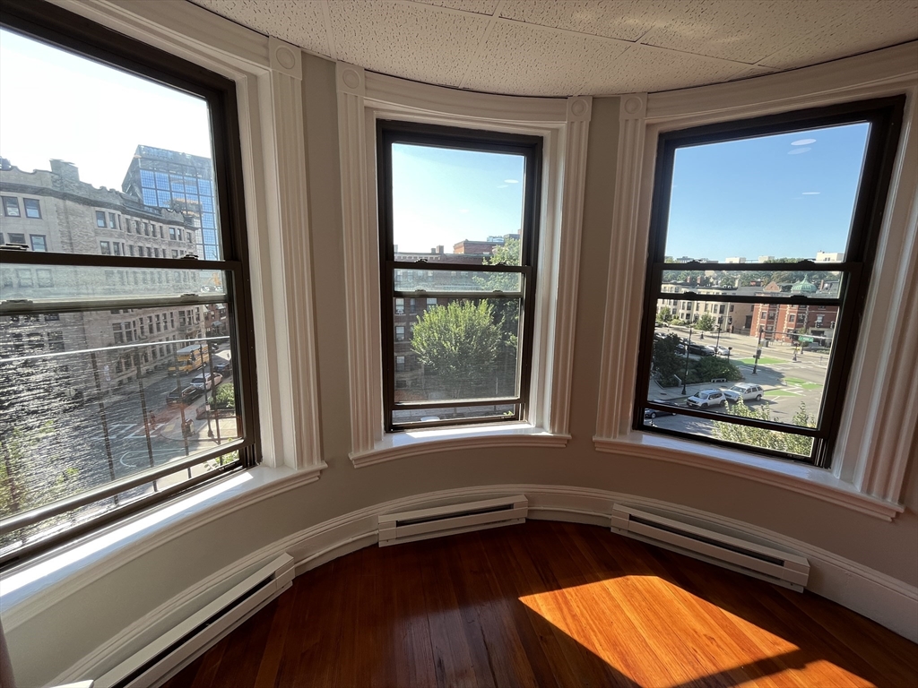 868 Beacon Street, Unit 15 Boston, MA 02215 - Photo 4 of 5 a view of a living room and a window
